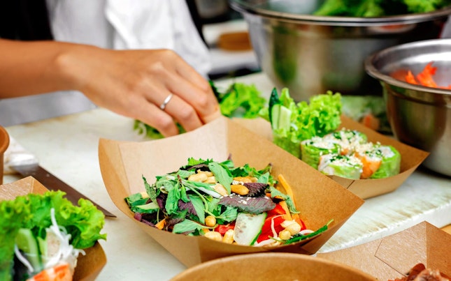 Woman eating salad